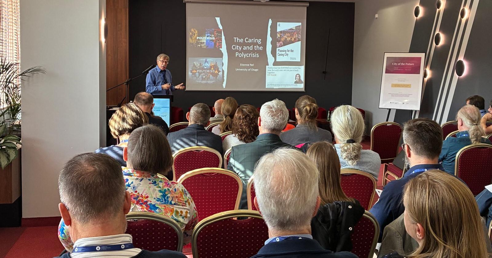 Representatives from YUFE partner universities and researchers from other international academic institutions accepted the invitation to the conference A lecture by one of the conference guests; a group of people can be seen listening to the talk
